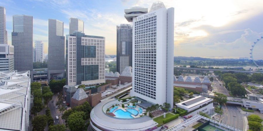 Pan Pacific Singapore overlooking Marina Bay, showcasing modern architecture and waterfront views.